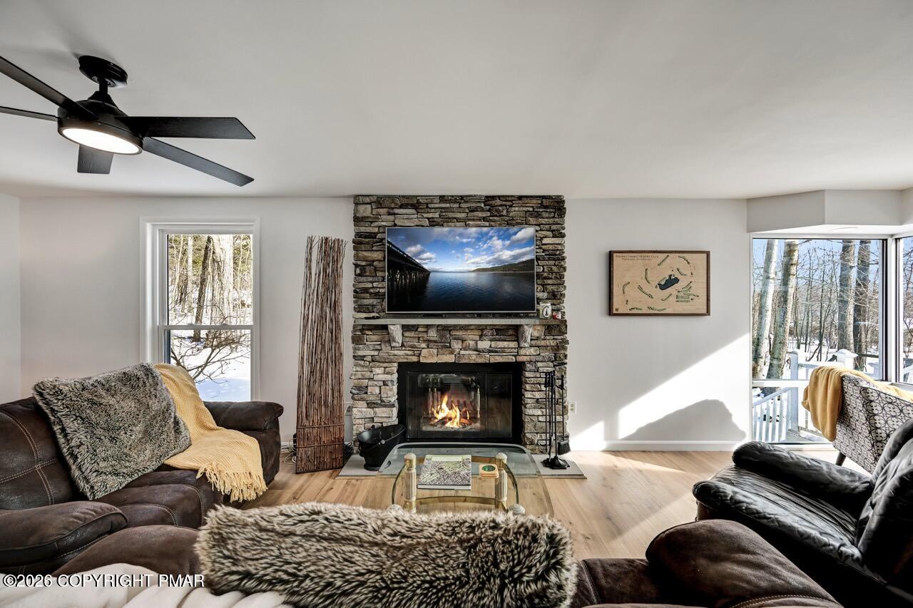 116 Spyglass Hill Road Tobyhanna, PA 18466 - Photo 10 of 73 a living room with furniture and a fireplace