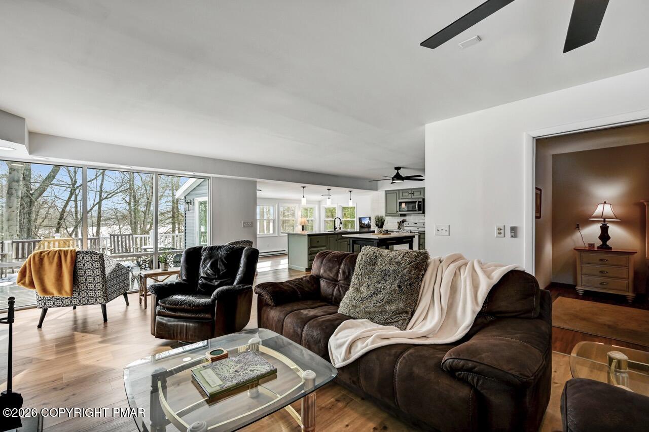116 Spyglass Hill Road Tobyhanna, PA 18466 - Photo 11 of 73 a living room with furniture and a large window