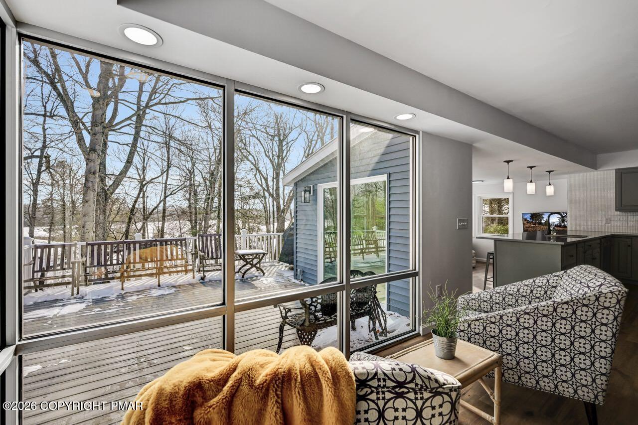 116 Spyglass Hill Road Tobyhanna, PA 18466 - Photo 13 of 73 a bedroom with furniture and large windows