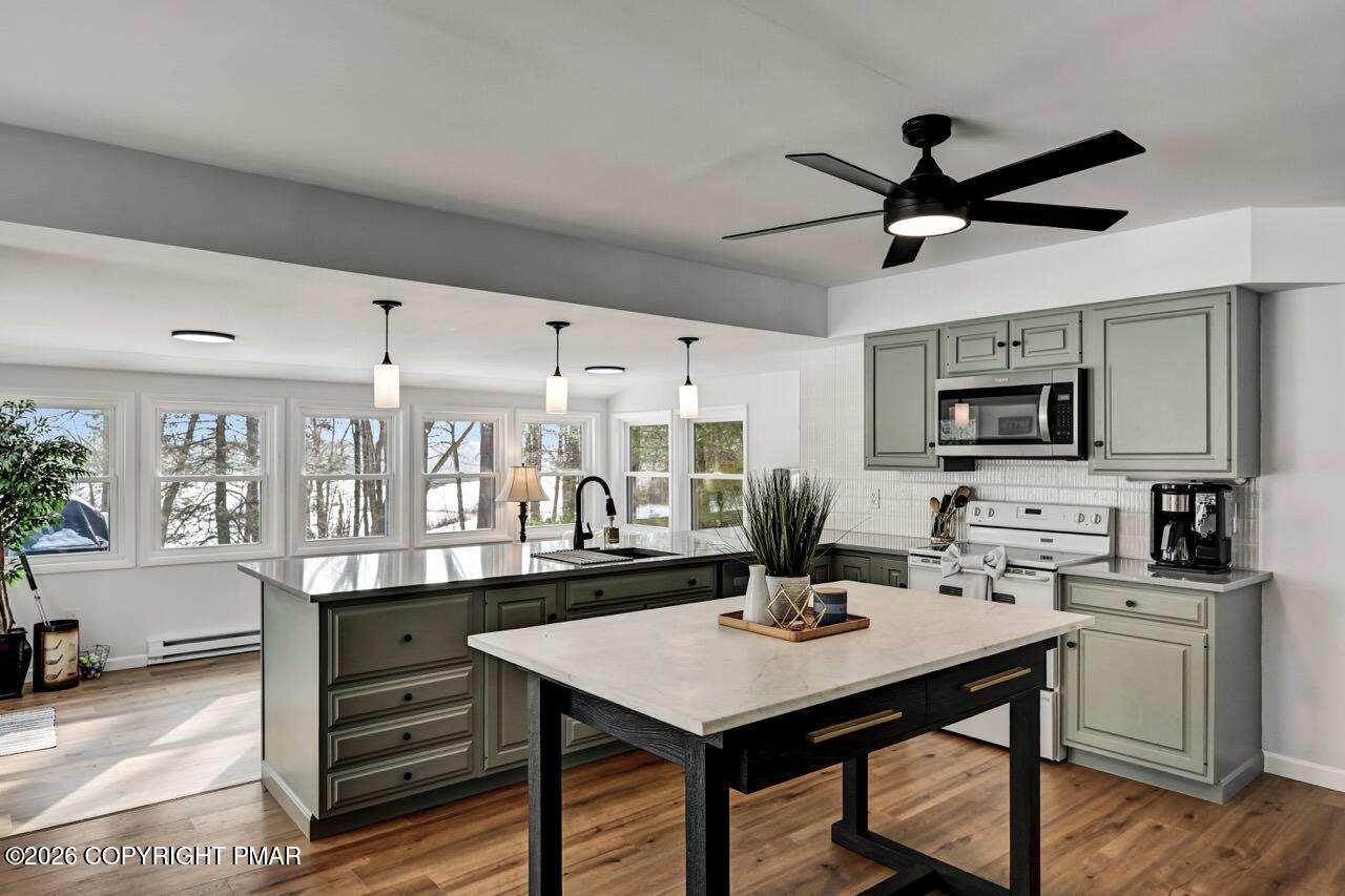 116 Spyglass Hill Road Tobyhanna, PA 18466 - Photo 14 of 73 a view of a dining room with furniture and a chandelier