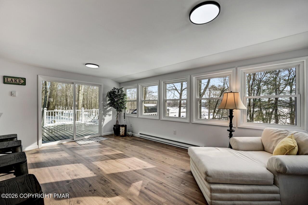 116 Spyglass Hill Road Tobyhanna, PA 18466 - Photo 20 of 73 a living room with furniture and a window