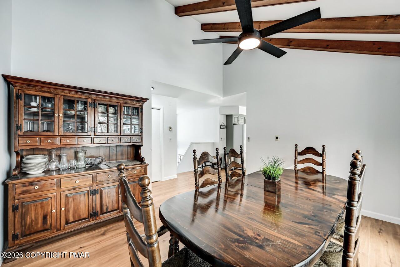 116 Spyglass Hill Road Tobyhanna, PA 18466 - Photo 29 of 73 a dining room with furniture and wooden floor