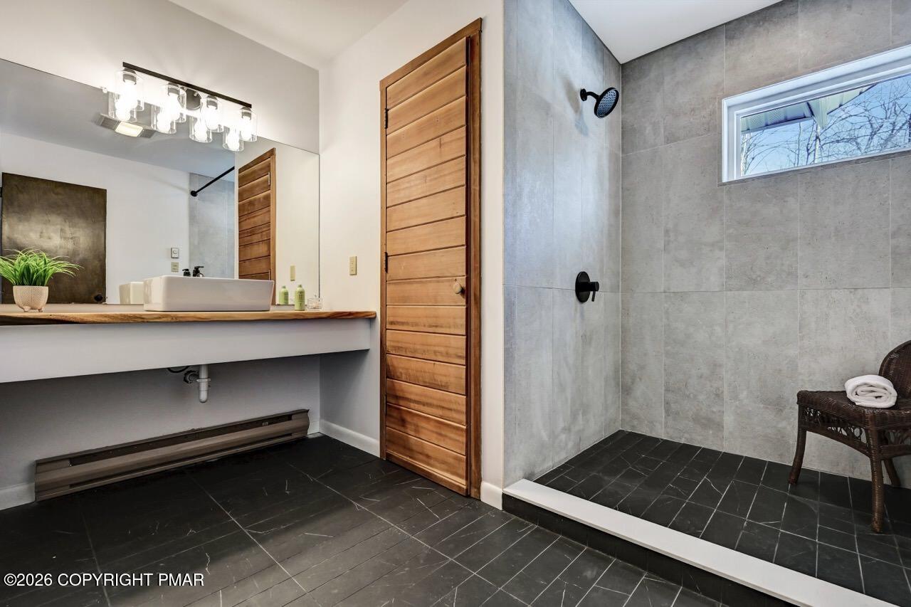 116 Spyglass Hill Road Tobyhanna, PA 18466 - Photo 34 of 73 a bathroom with a sink and a mirror