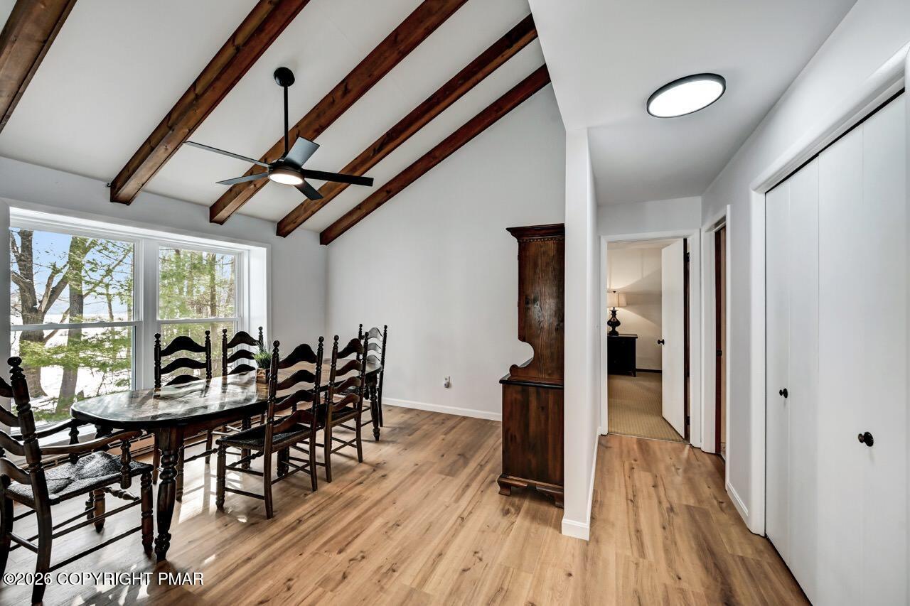 116 Spyglass Hill Road Tobyhanna, PA 18466 - Photo 39 of 73 a view of a dining room with furniture window and wooden floor