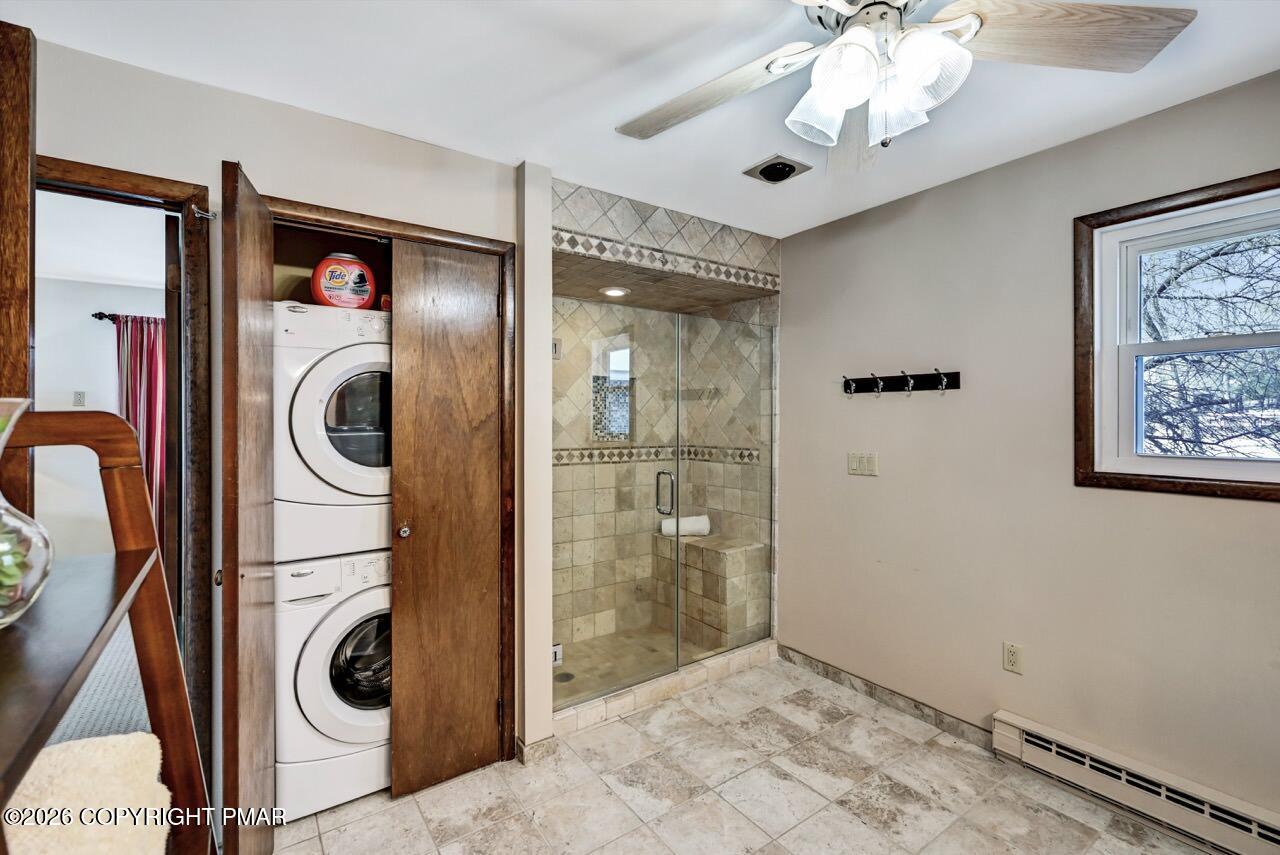 116 Spyglass Hill Road Tobyhanna, PA 18466 - Photo 42 of 73 a view of a hallway with washer and dryer