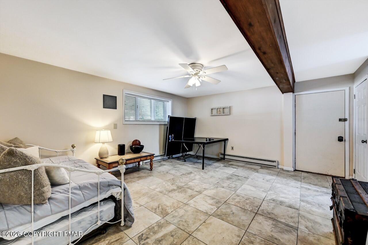 116 Spyglass Hill Road Tobyhanna, PA 18466 - Photo 48 of 73 a bedroom with furniture and a large window