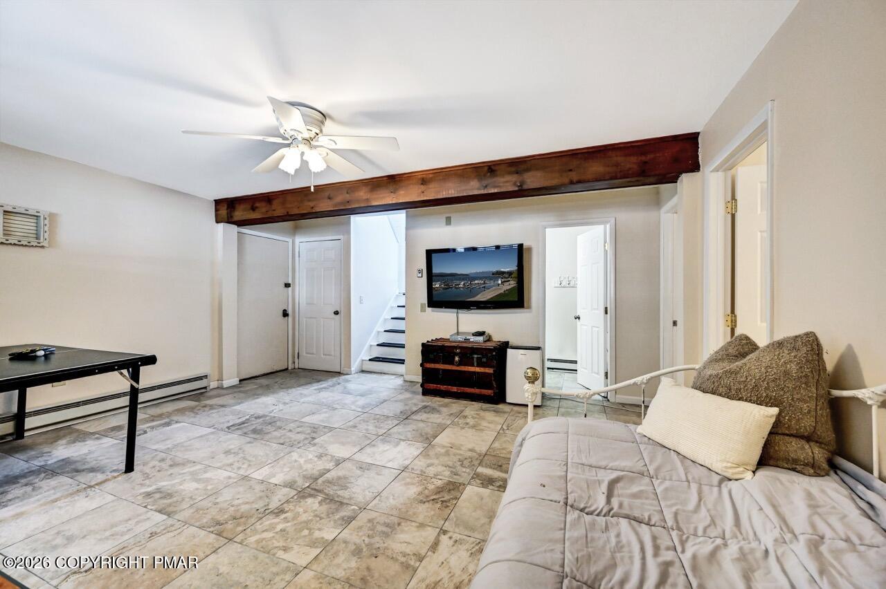 116 Spyglass Hill Road Tobyhanna, PA 18466 - Photo 49 of 73 a living room with furniture and a flat screen tv