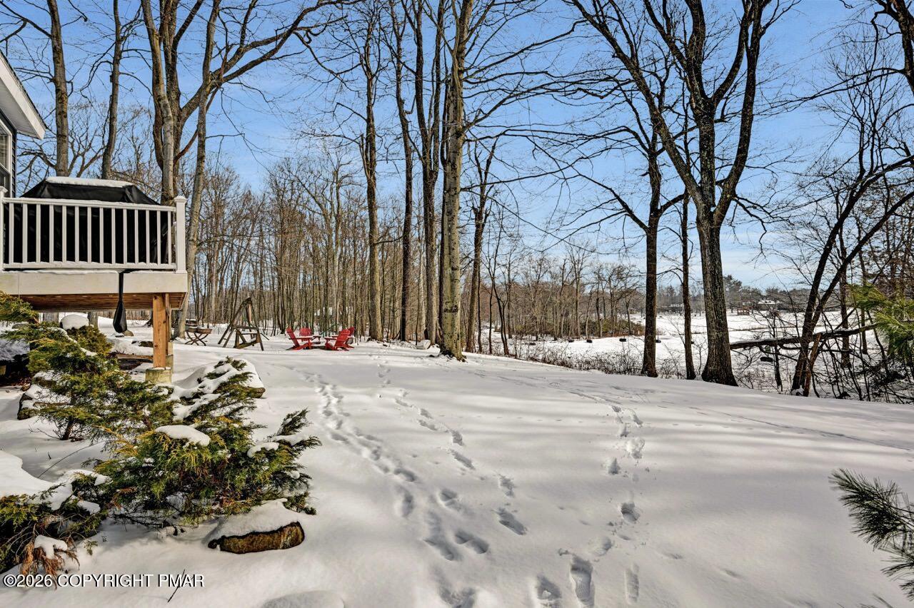 116 Spyglass Hill Road Tobyhanna, PA 18466 - Photo 64 of 73 a street view with large trees