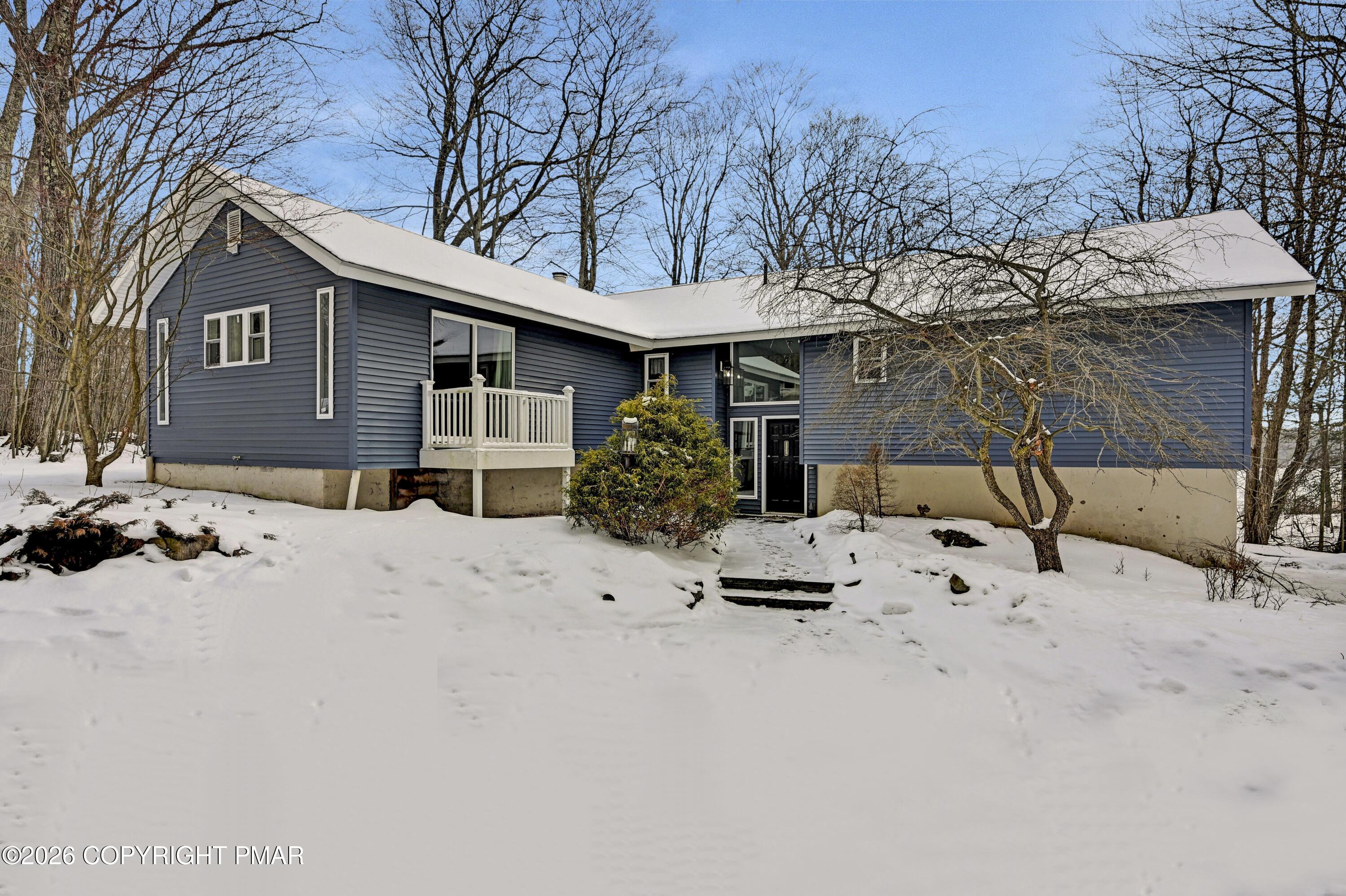116 Spyglass Hill Road Tobyhanna, PA 18466 - Photo 69 of 73 a front view of a house with yard and seating area