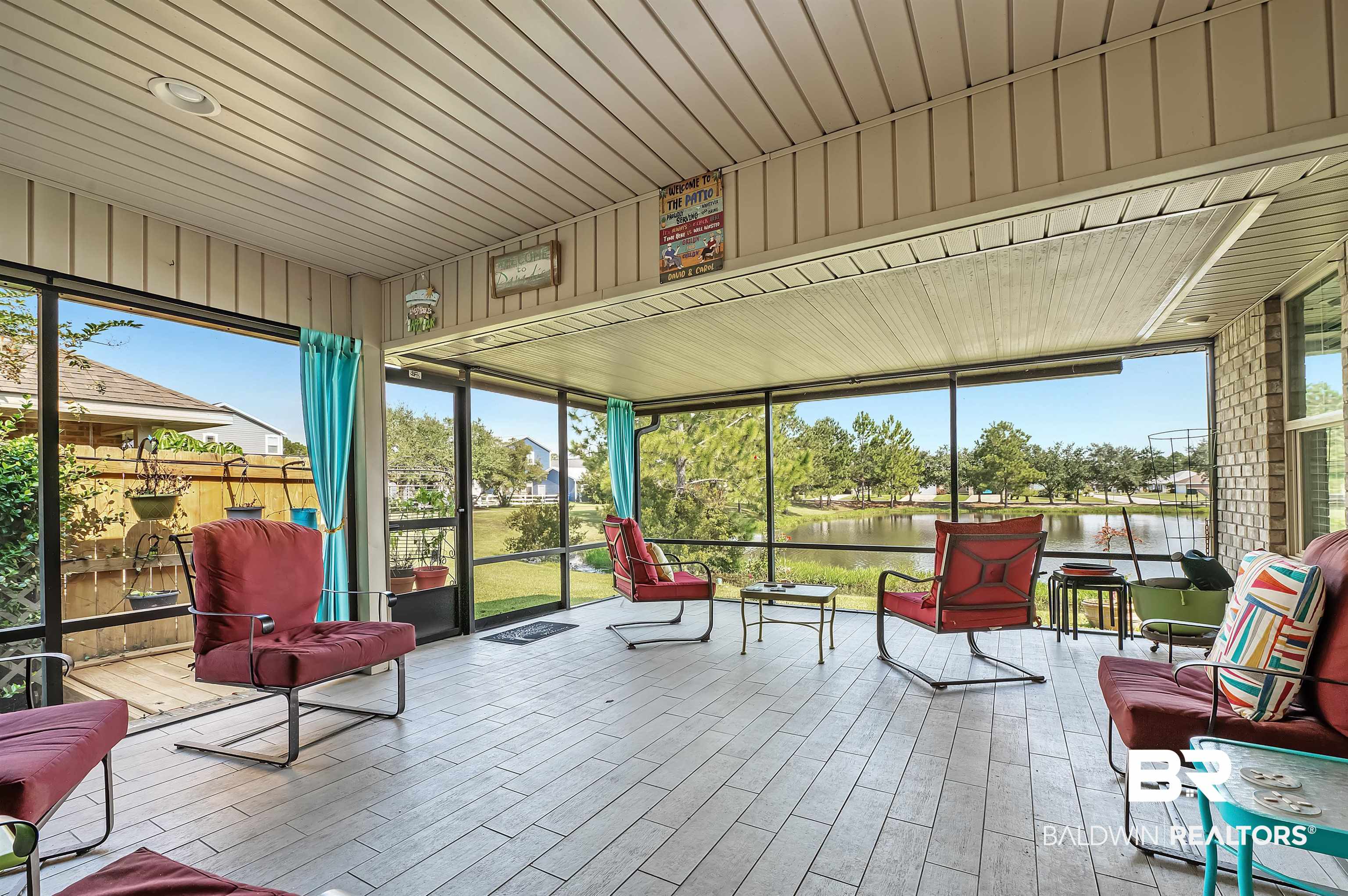 8896 Allay Lane Foley, AL 36535 - Photo 56 of 57 Sunroom with a water view and wooden ceiling