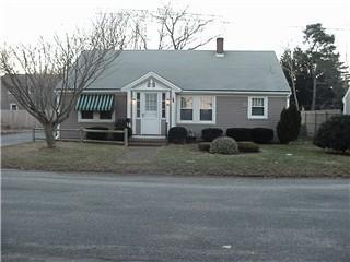 Undisclosed Address Hyannis, MA 02601 - Photo 1 of 1 a front view of a house with a yard
