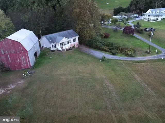 a view of backyard with outdoor space