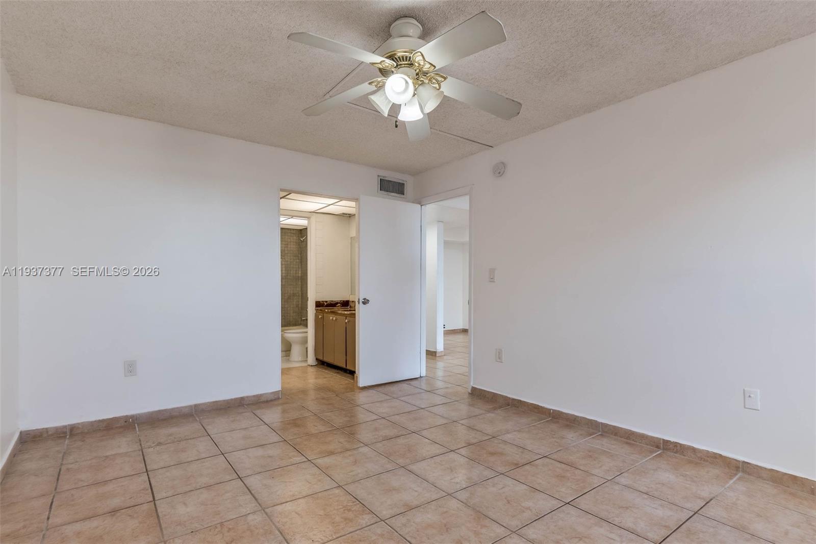 10985 Southwest 107th Street, Unit 310 Miami, FL 33176 - Photo 11 of 30 a view of an empty room