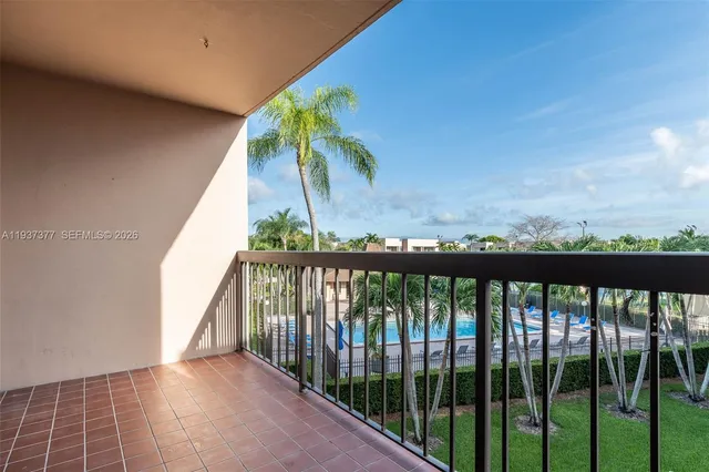 a view of balcony with furniture