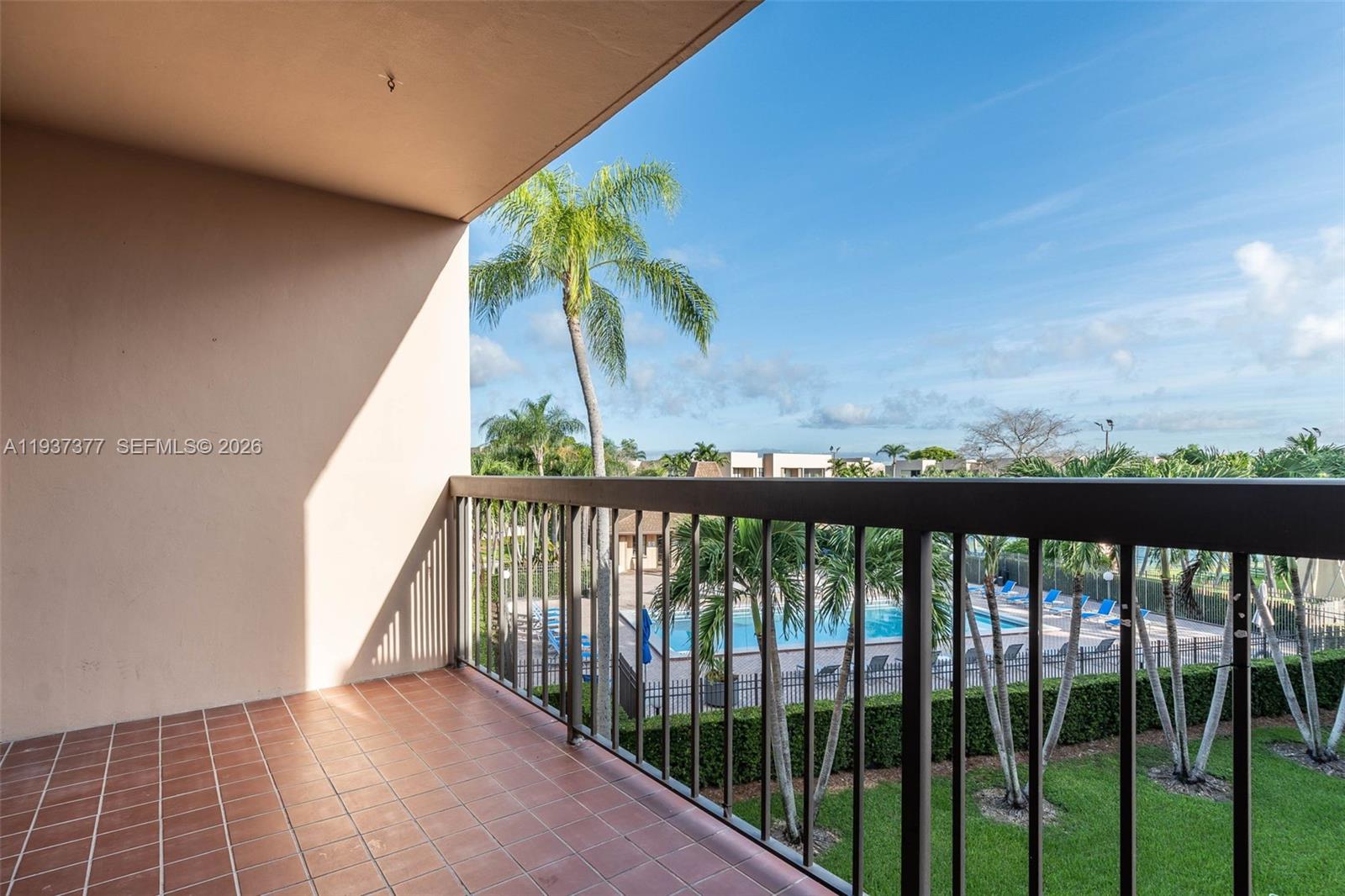 10985 Southwest 107th Street, Unit 310 Miami, FL 33176 - Photo 15 of 30 a view of balcony with furniture