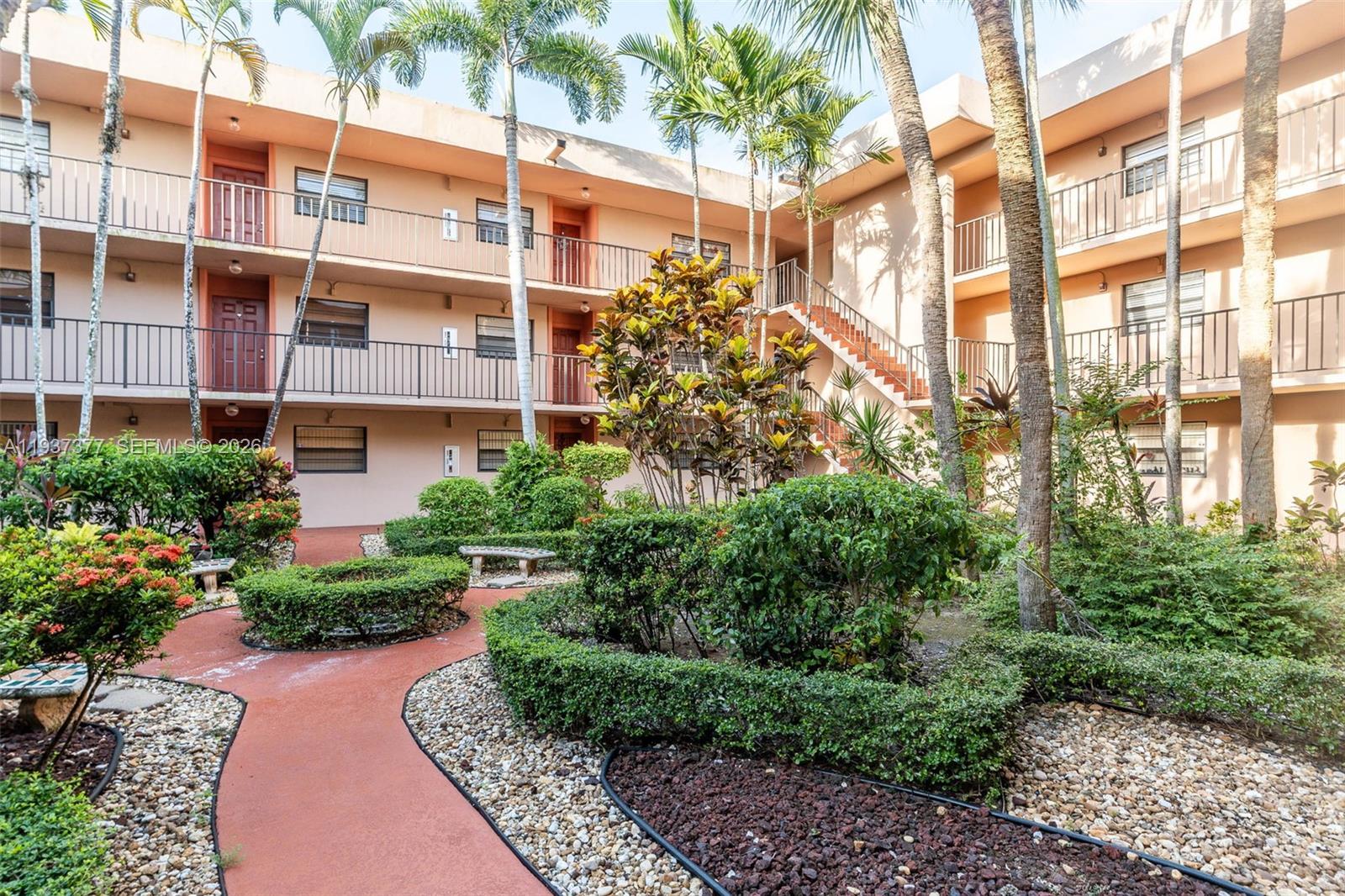 10985 Southwest 107th Street, Unit 310 Miami, FL 33176 - Photo 23 of 30 a view of a tall building