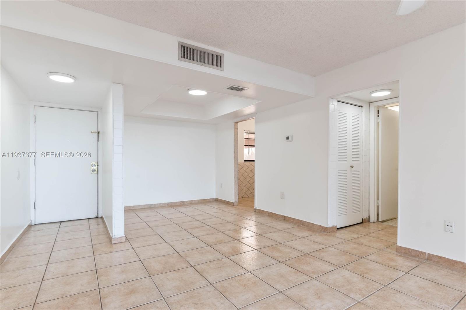 10985 Southwest 107th Street, Unit 310 Miami, FL 33176 - Photo 3 of 30 a view of an empty room
