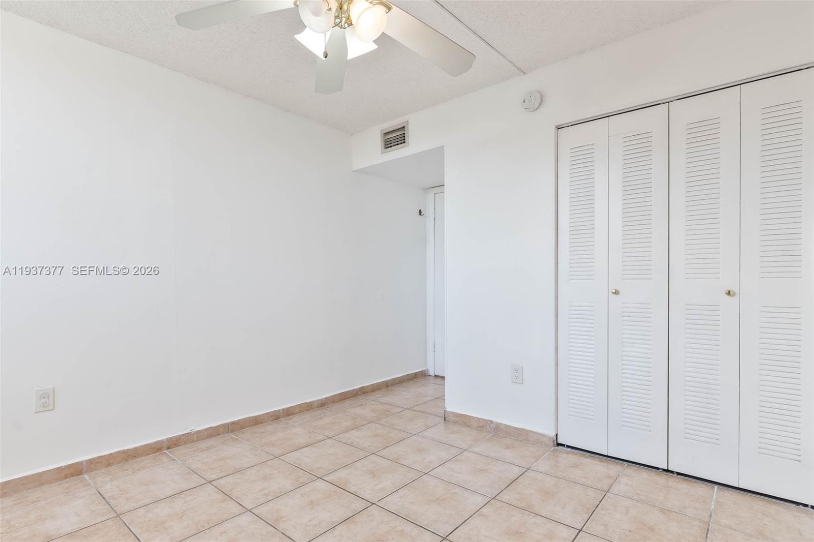 10985 Southwest 107th Street, Unit 310 Miami, FL 33176 - Photo 9 of 30 a view of an empty room