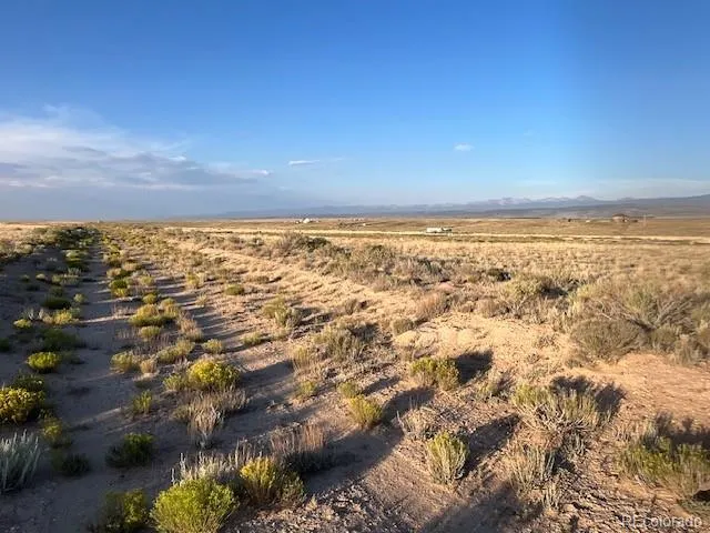 an aerial view of residential building and ocean