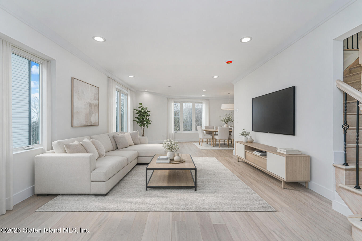 54 Cedarcliff Road Staten Island, NY 10301 - Photo 20 of 49 a living room with furniture and a flat screen tv