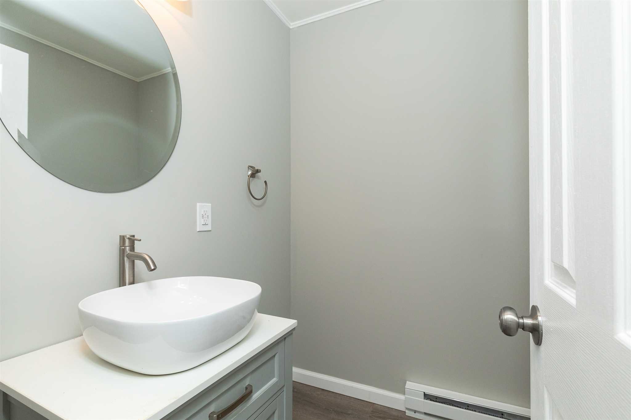 29 Milano Drive LaGrange, NY 12603 - Photo 16 of 21 a bathroom with a sink and a mirror