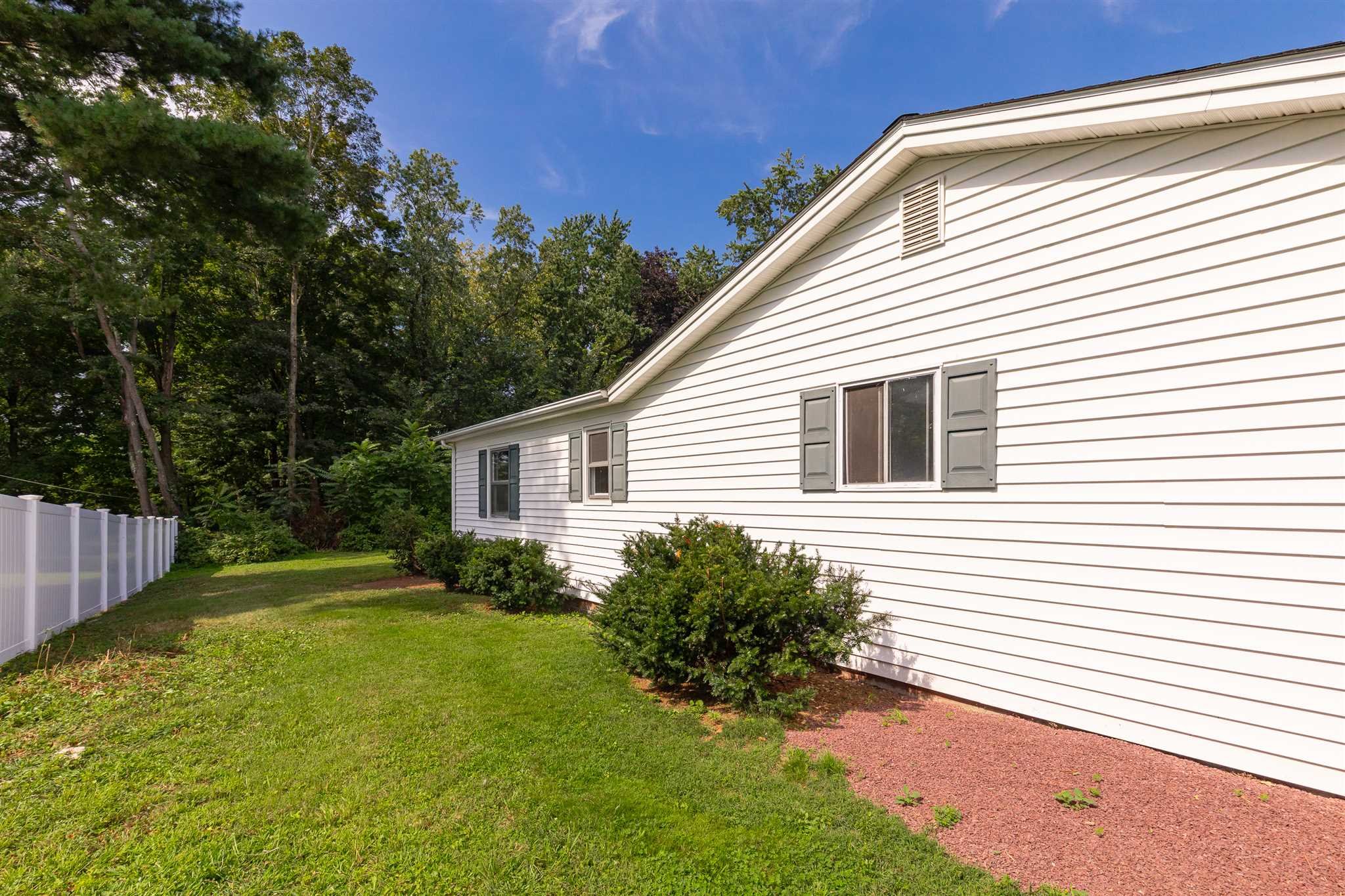 29 Milano Drive LaGrange, NY 12603 - Photo 20 of 21 a view of a backyard with plants and large tree