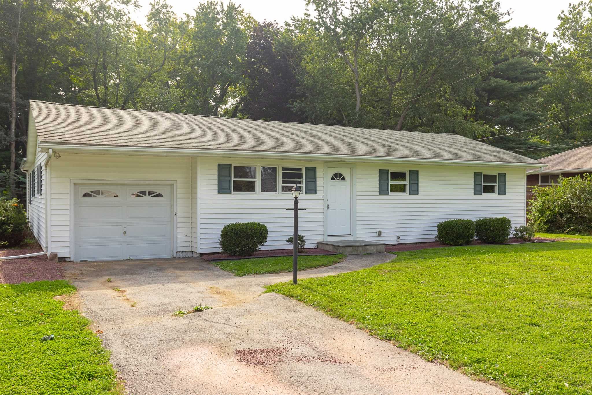 29 Milano Drive LaGrange, NY 12603 - Photo 21 of 21 a view of a house with backyard and a tree