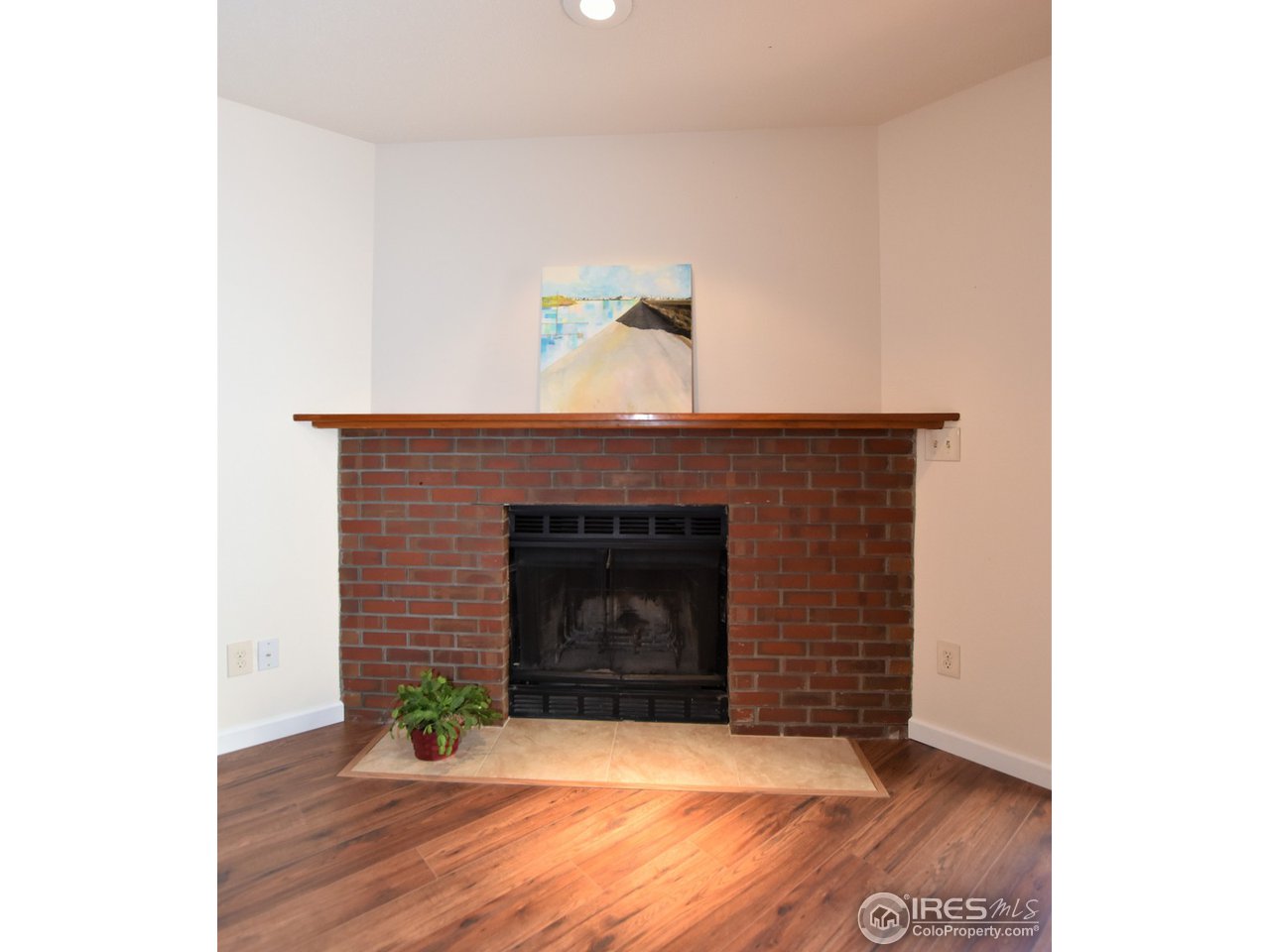 1440 Edora Road, Unit 15 Fort Collins, CO 80525 - Photo 5 of 25 Wood burning fireplace