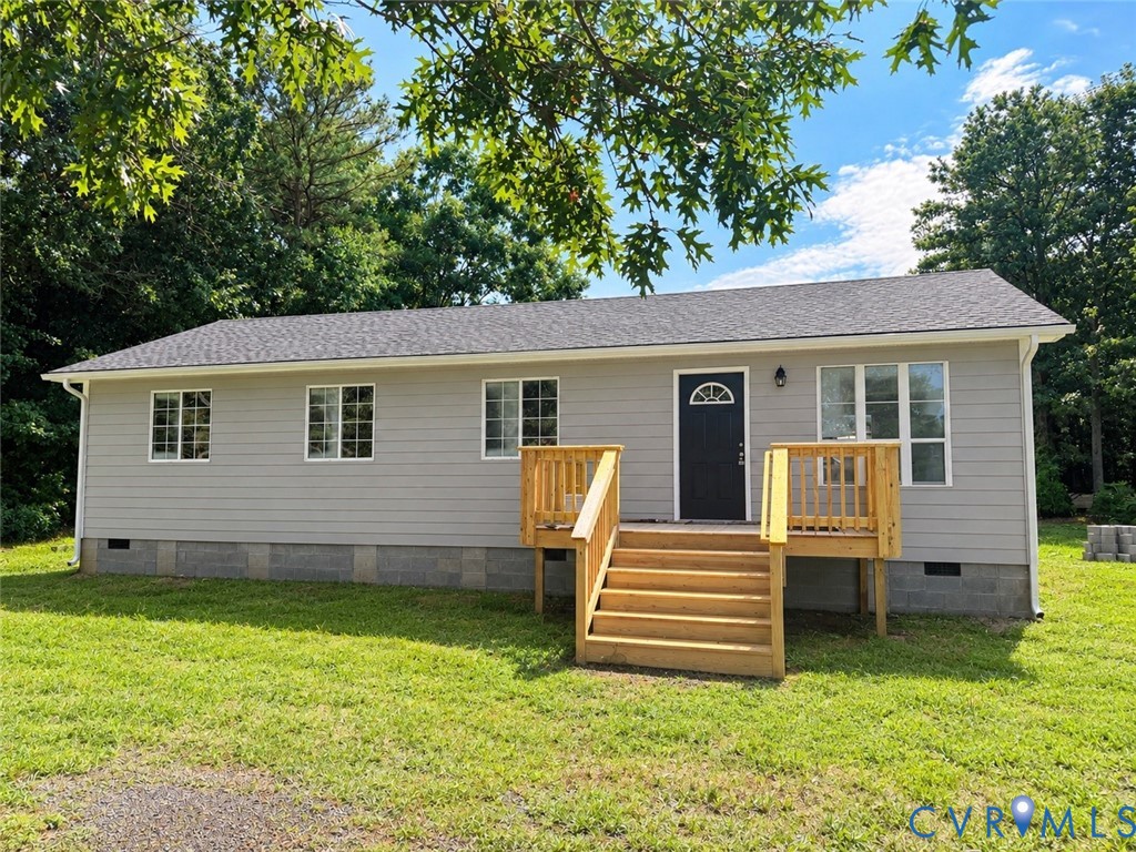6927 Carsley Road Waverly, VA 23890 - Photo 1 of 1 Light gray siding exterior with a dark gray shingl