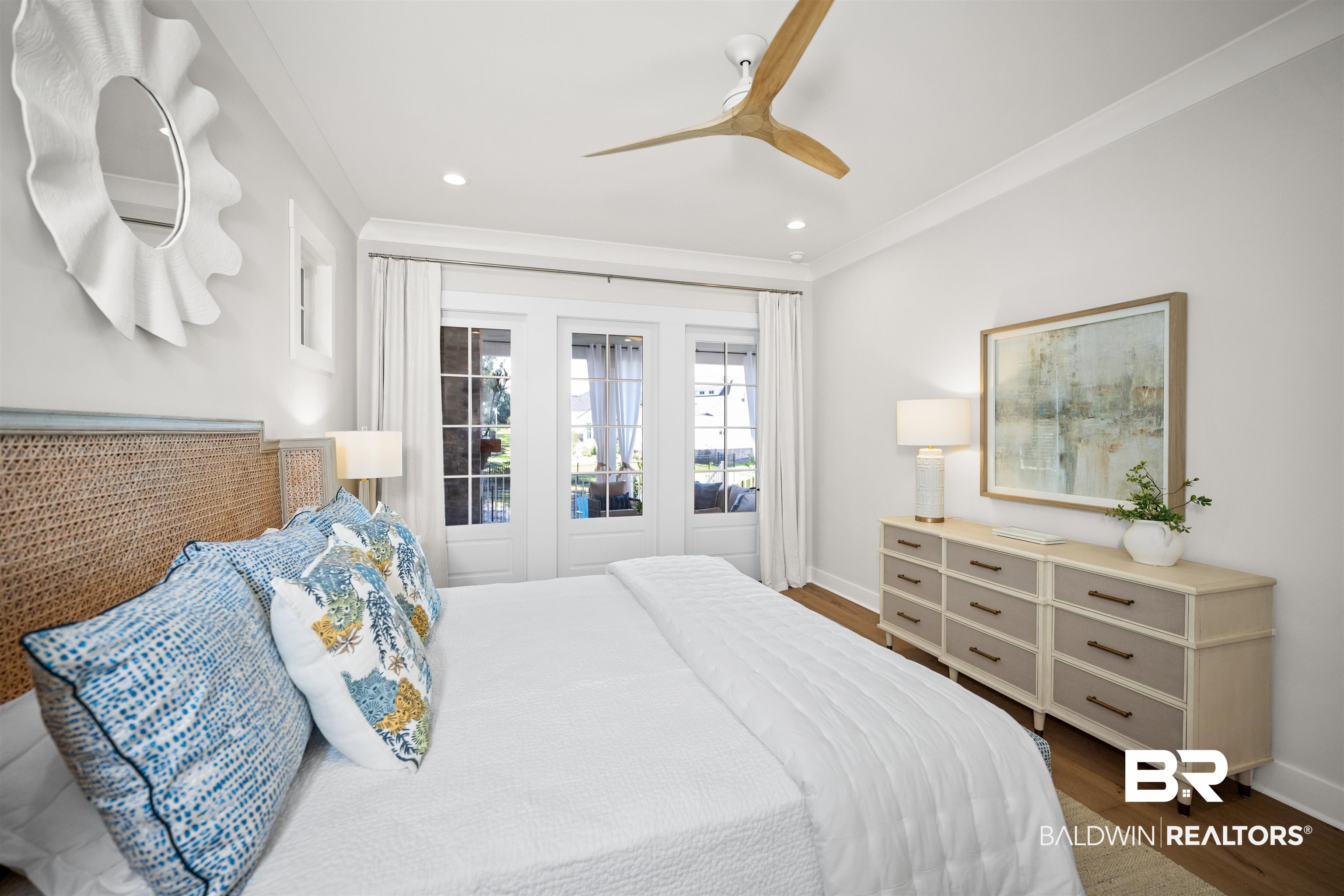 156 Hyacinth Street Fairhope, AL 36532 - Photo 31 of 61 Bedroom with dark wood finished floors, ornamental molding, a ceiling fan, and recessed lighting