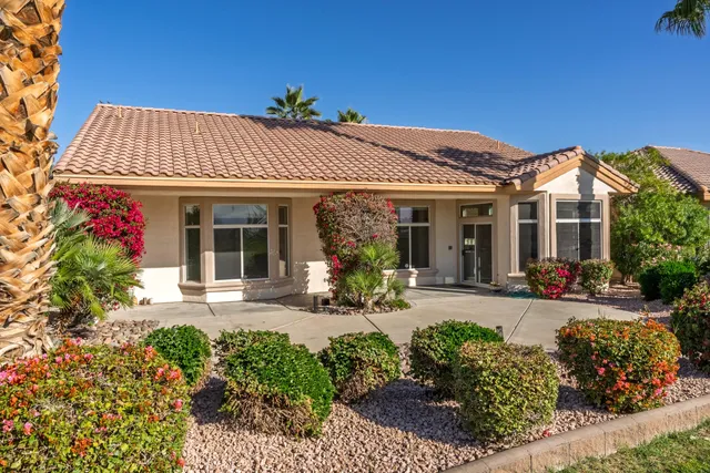 front view of a house with a small yard
