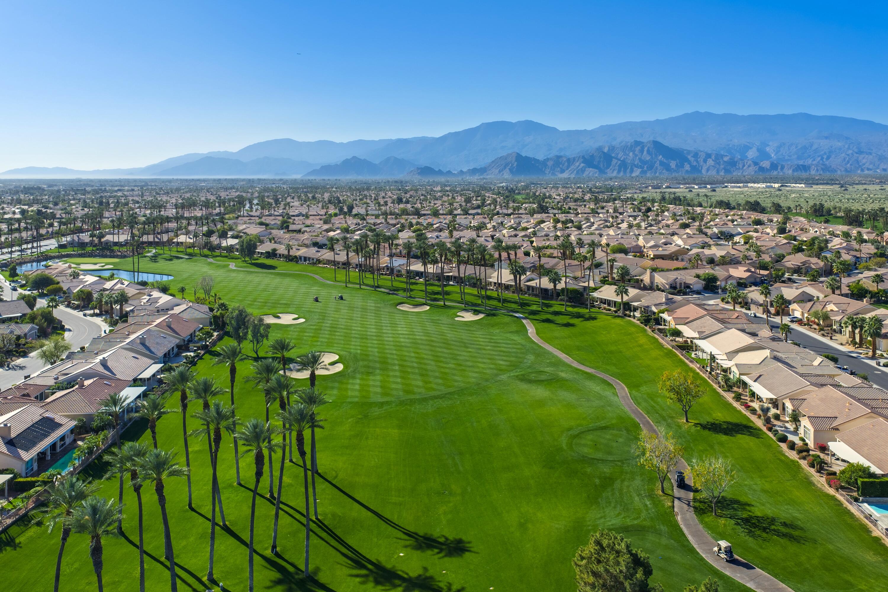 35440 Moorbrook Road Palm Desert, CA 92211 - Photo 7 of 32 a view of a city with mountains in the background