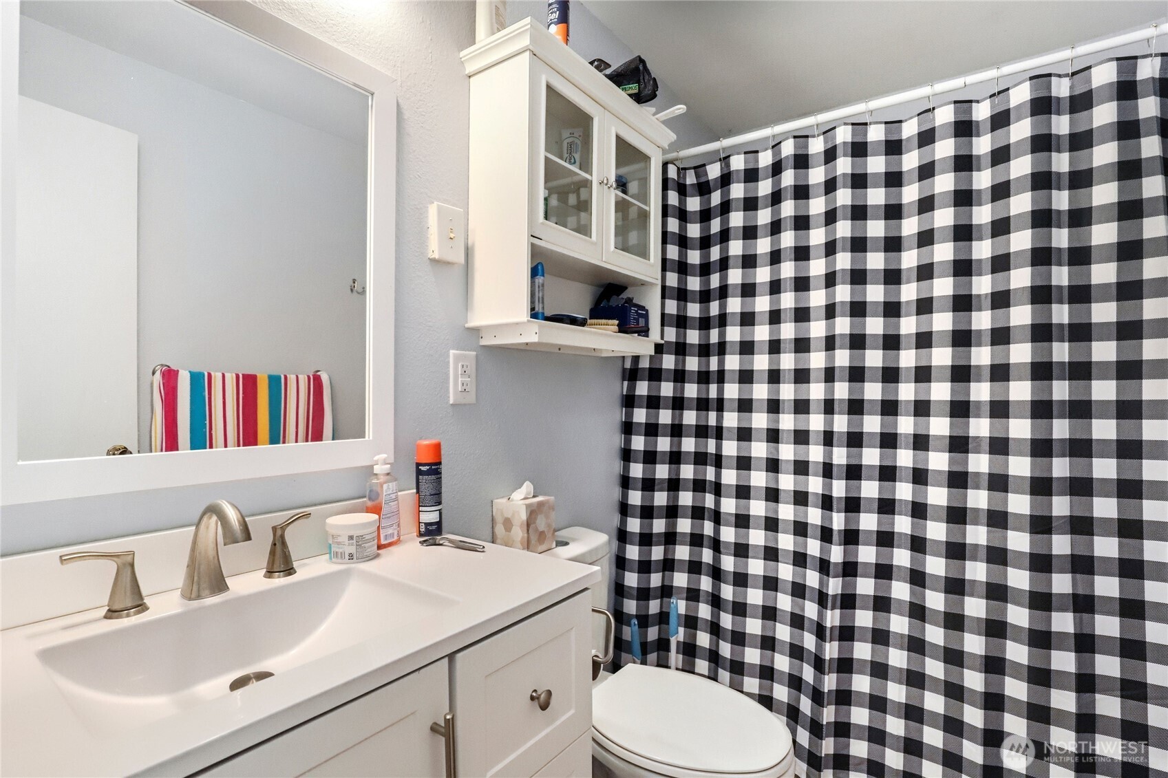 2533 Fir Avenue Bremerton, WA 98310 - Photo 27 of 38 a bathroom with a sink toilet vanity and shower