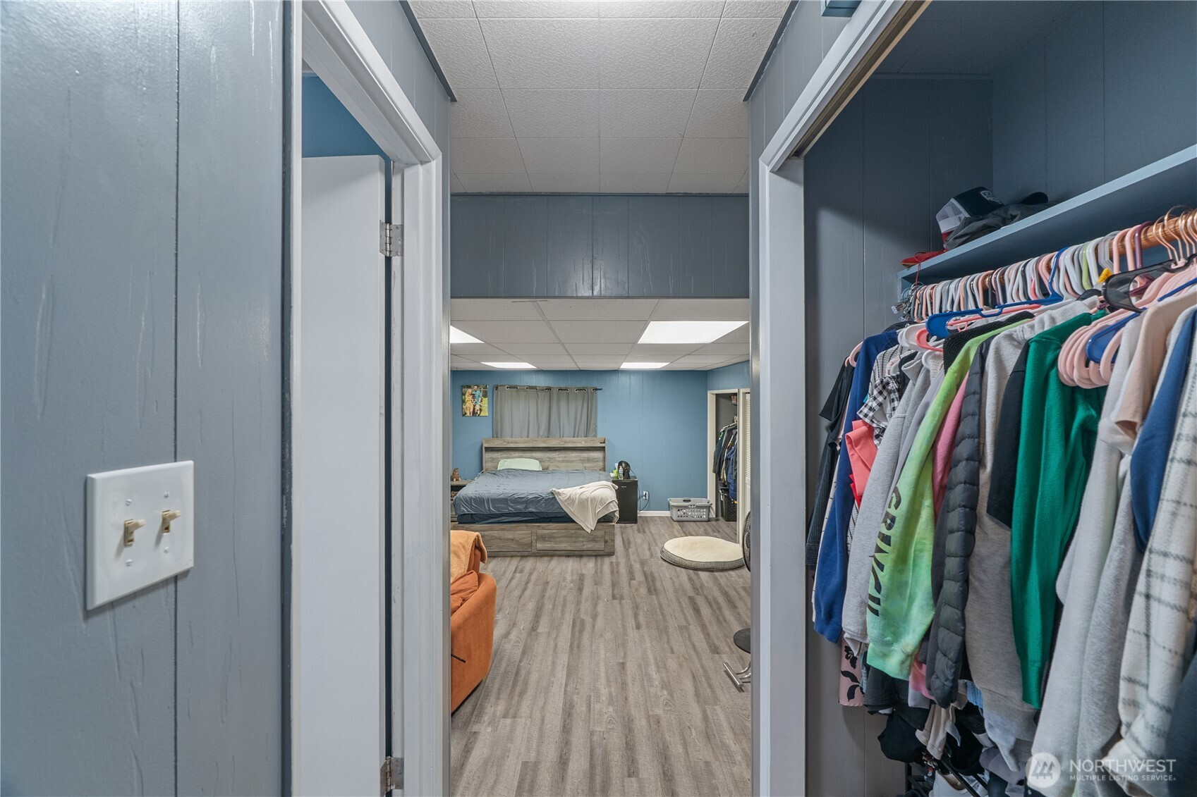 619 Spruce Street Hoquiam, WA 98550 - Photo 15 of 30 a view of walk in closet with clothes and shoes