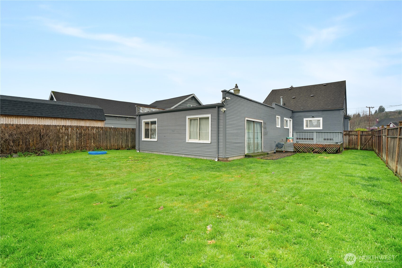 619 Spruce Street Hoquiam, WA 98550 - Photo 24 of 30 a view of a house with backyard