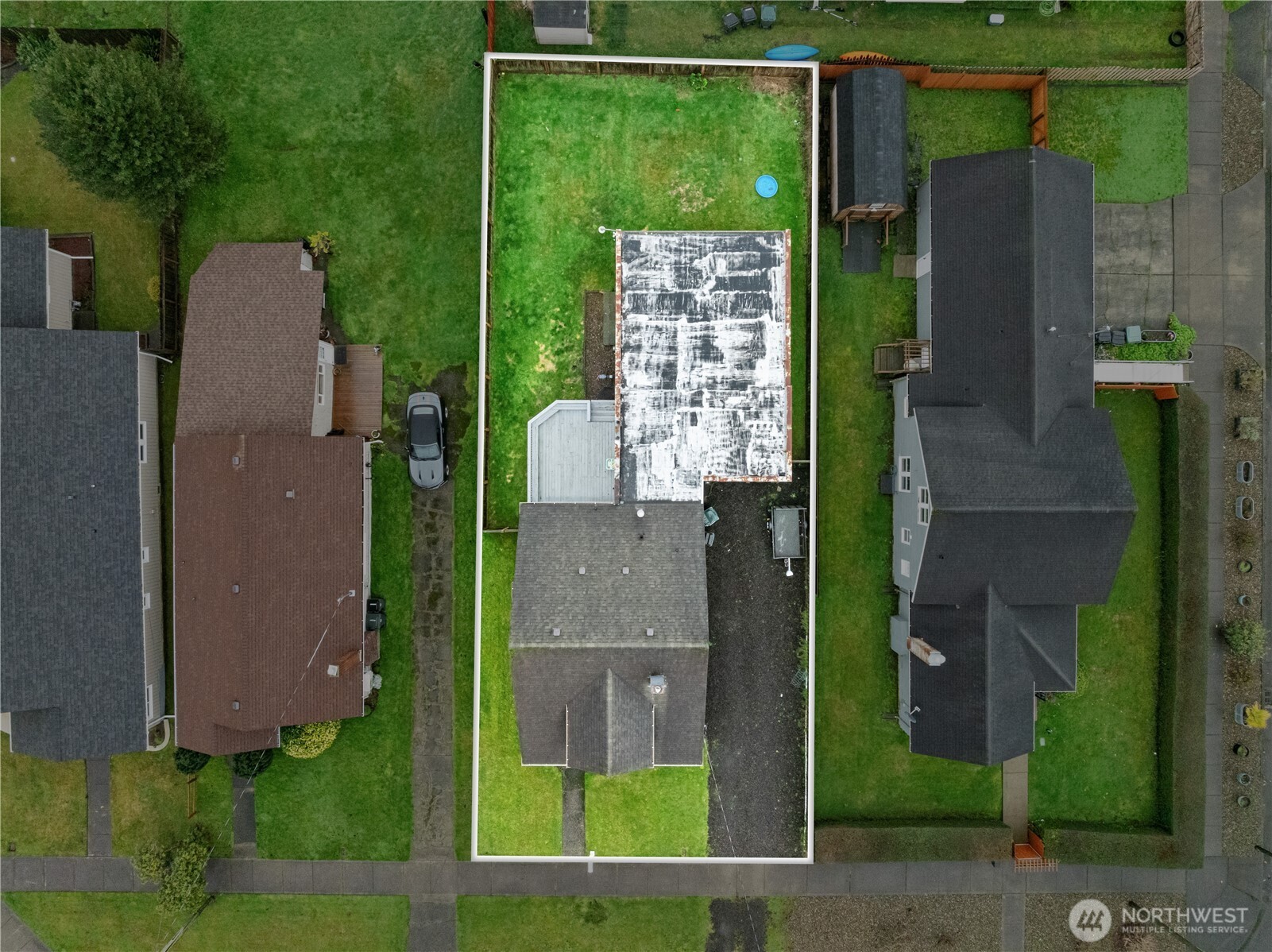 619 Spruce Street Hoquiam, WA 98550 - Photo 27 of 30 aerial view of a house with a yard