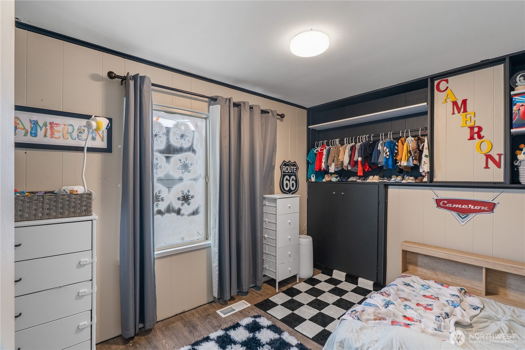 619 Spruce Street Hoquiam, WA 98550 - Photo 9 of 30 a bedroom with a bed and a window