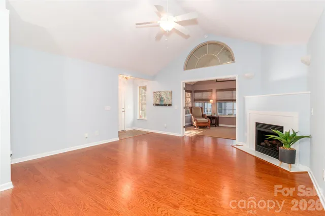 a kitchen with stainless steel appliances granite countertop a refrigerator stove and sink