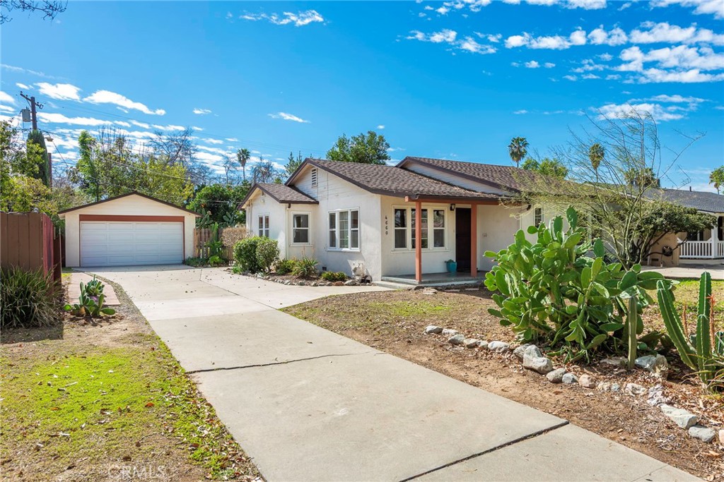 4660 Cover Street Riverside, CA 92506 - Photo 3 of 45 a front view of a house with a yard