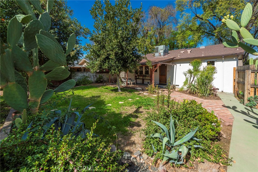 4660 Cover Street Riverside, CA 92506 - Photo 35 of 45 a view of a house with a yard