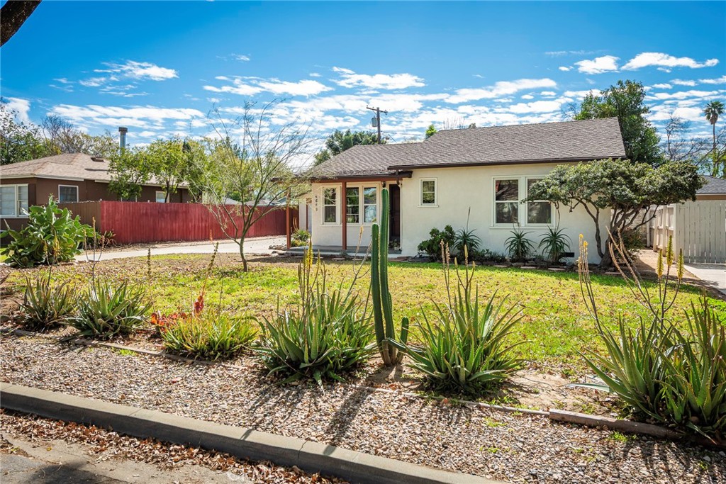 4660 Cover Street Riverside, CA 92506 - Photo 4 of 45 a front view of house with yard