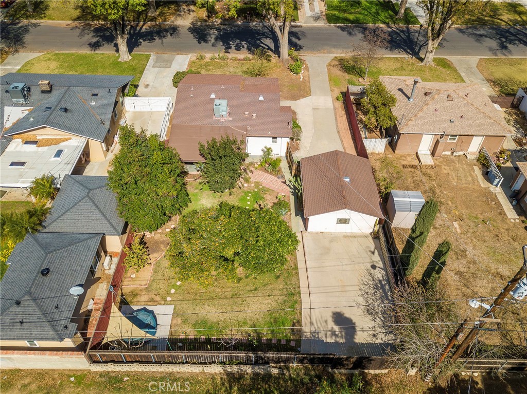 4660 Cover Street Riverside, CA 92506 - Photo 8 of 45 an aerial view of a house with a yard and lake view