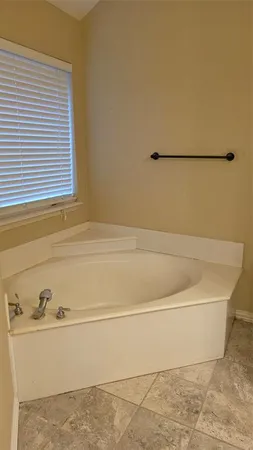 a bathroom with a bathtub