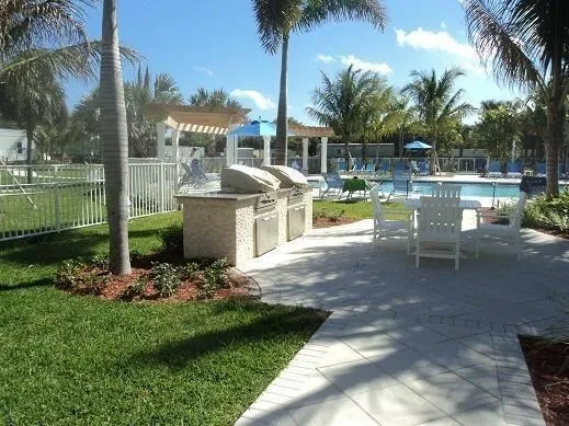 a room with gym equipment and windows