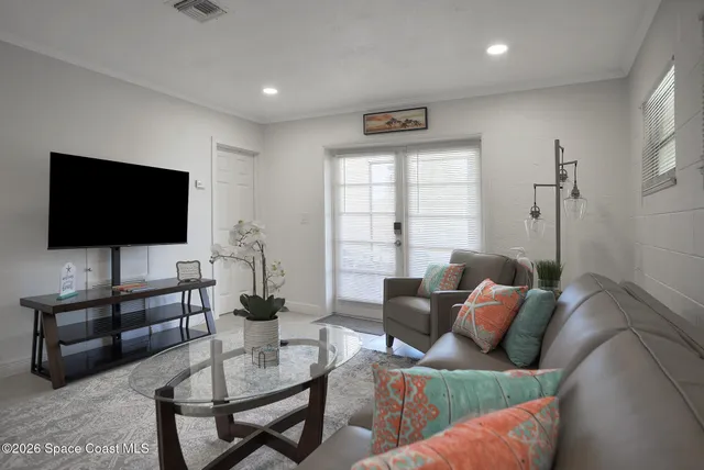 a kitchen with a sink cabinets and refrigerator