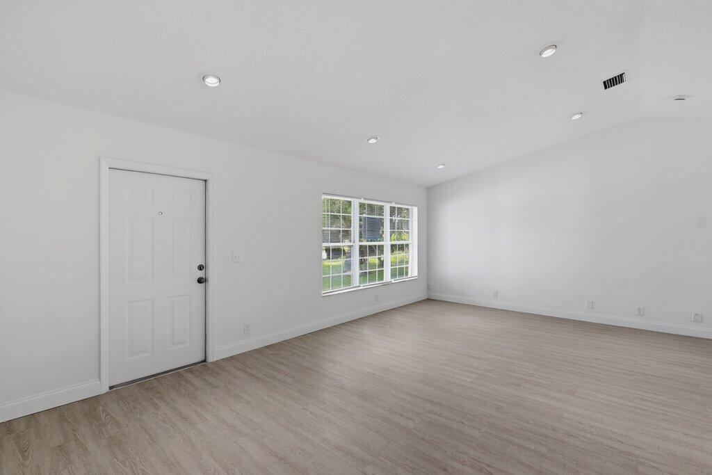 6900 2nd Street Jupiter, FL 33458 - Photo 4 of 24 Foyer to Living.jpeg-SMALL