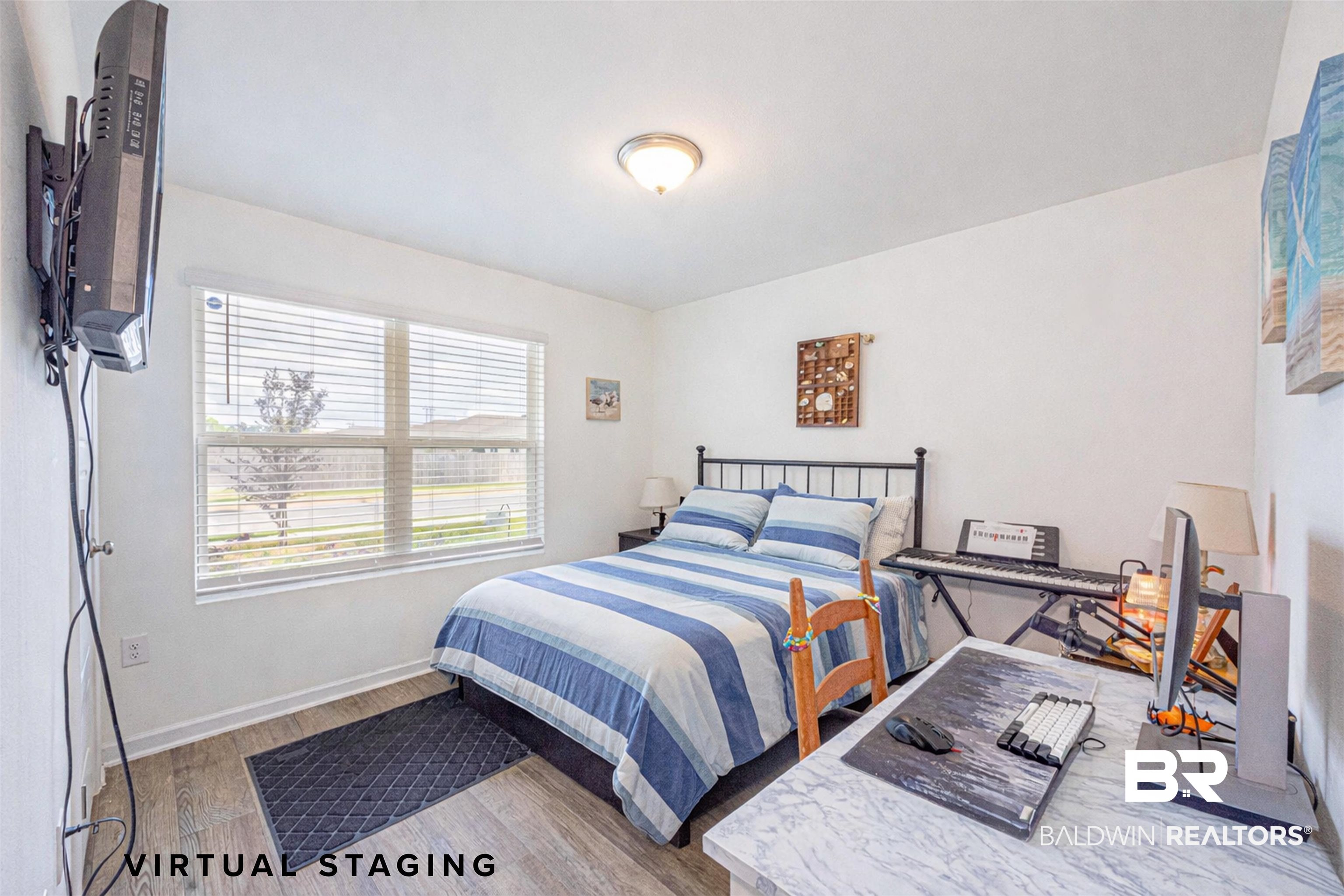 14843 Forsythia Loop Silverhill, AL 36576 - Photo 32 of 51 Virtually Staged Bedroom featuring light wood finished floors and baseboards