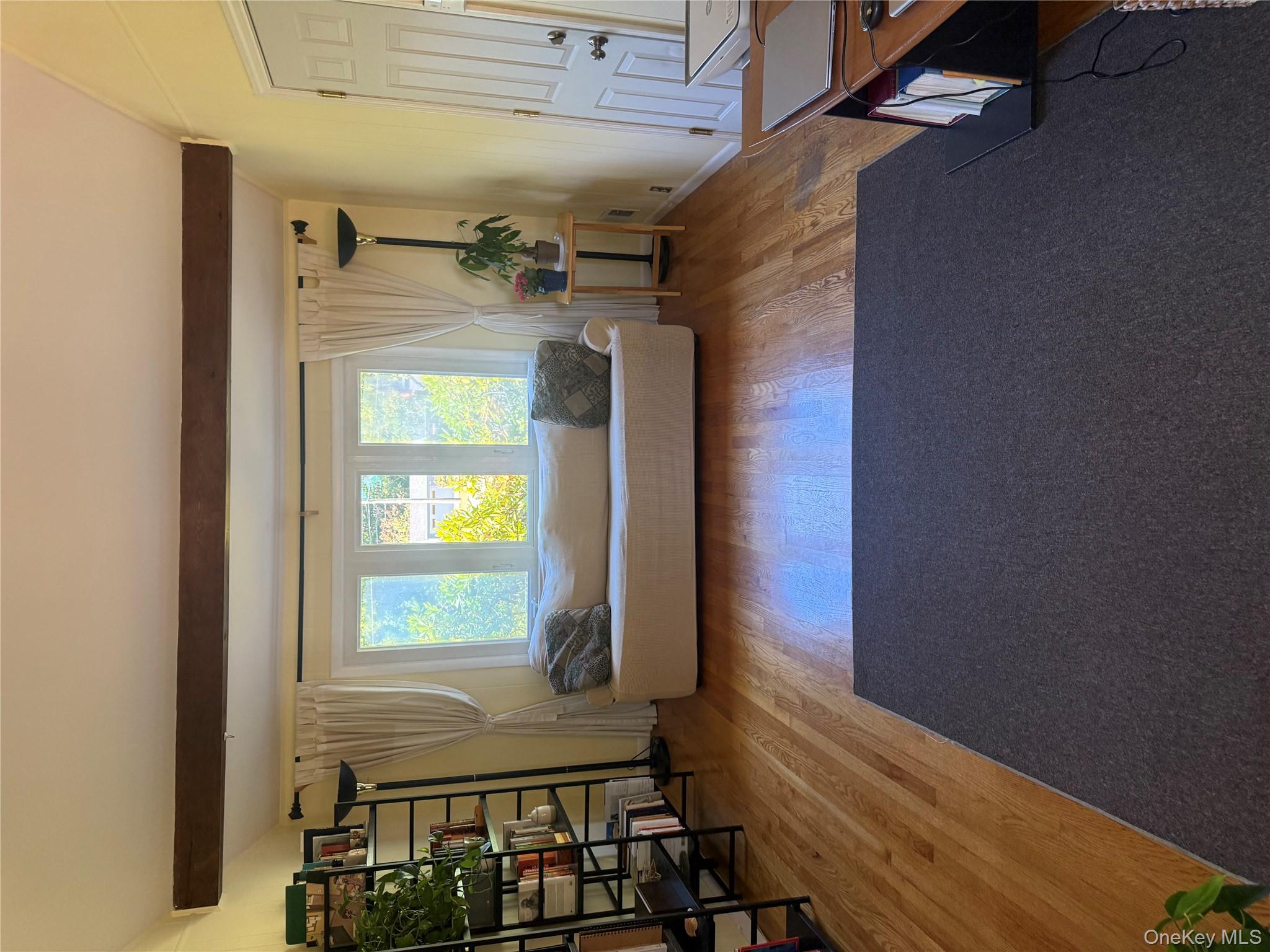 18 Adams Road Ossining, NY 10562 - Photo 12 of 41 Living area featuring light wood-style flooring
