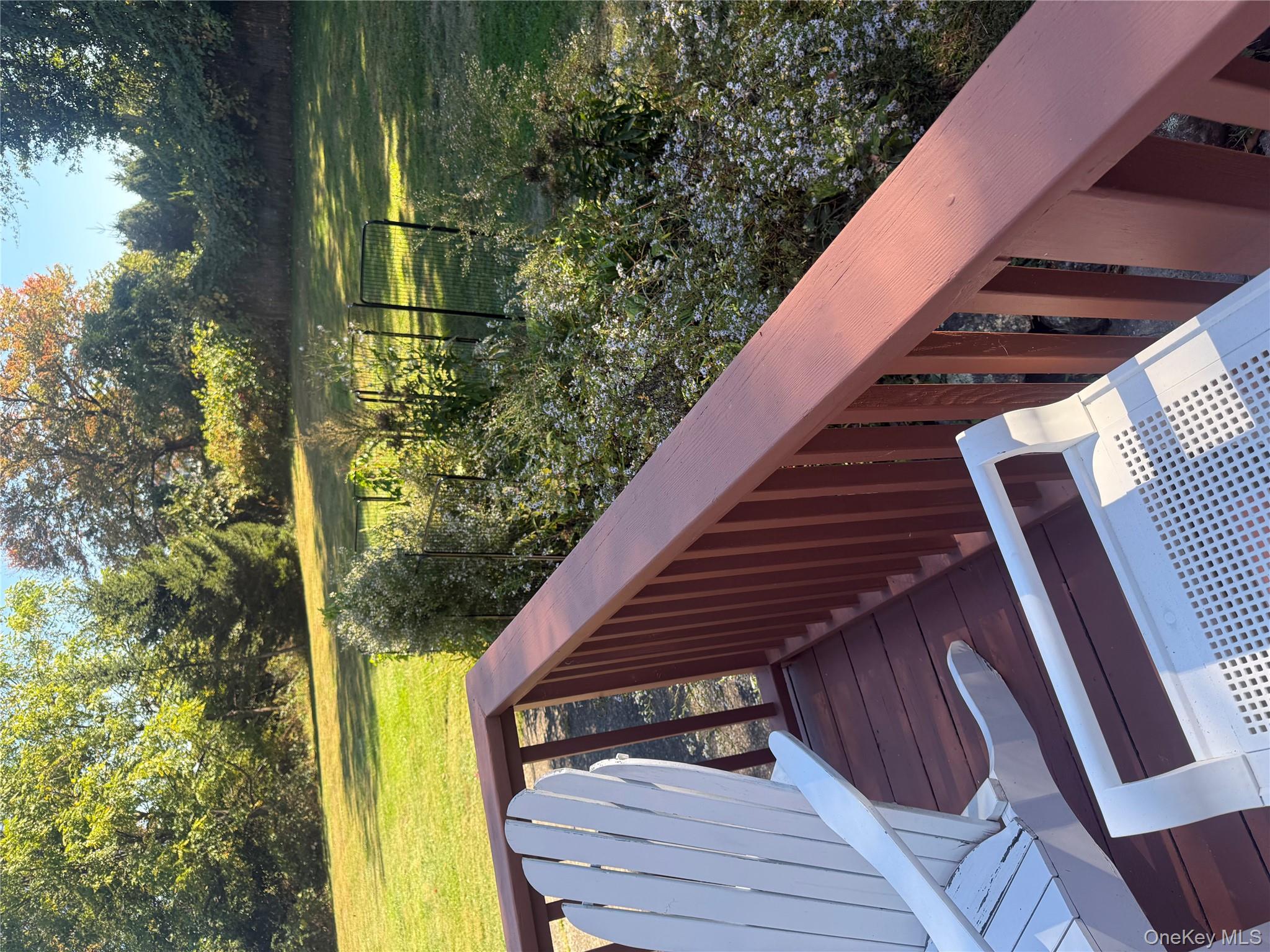 18 Adams Road Ossining, NY 10562 - Photo 24 of 41 Wooden deck featuring a yard