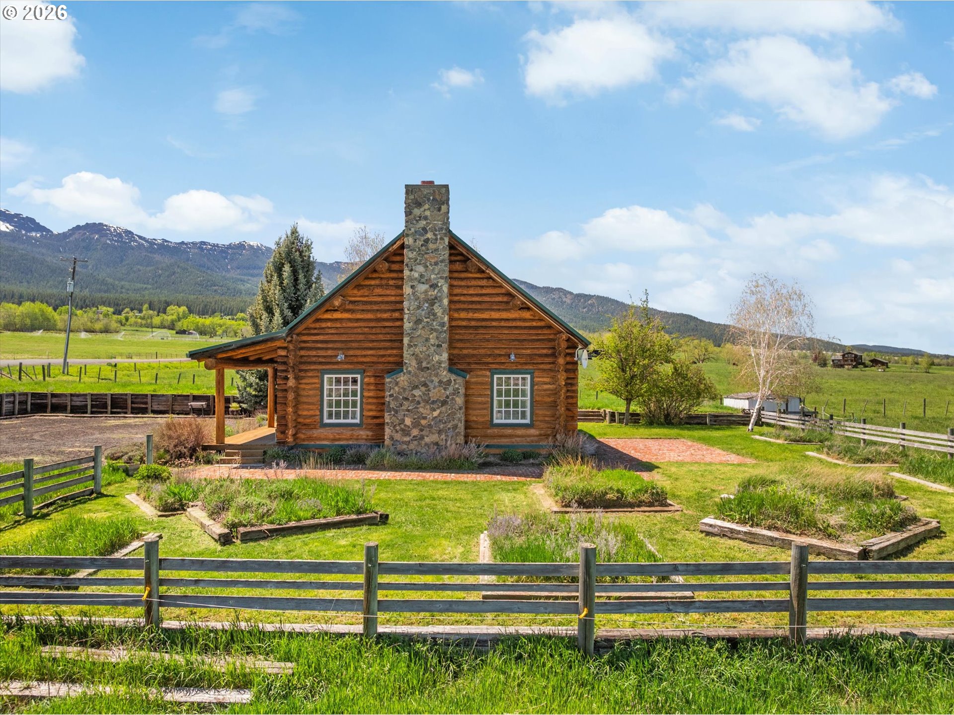 64782 Alder Slope Road Enterprise, OR 97828 - Photo 5 of 48 a front view of a house with a yard